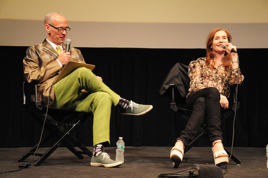 John Waters and Isabelle Huppert at The Walter Reade Theater courtesy of FSLC. Photo by Julie Cunnah