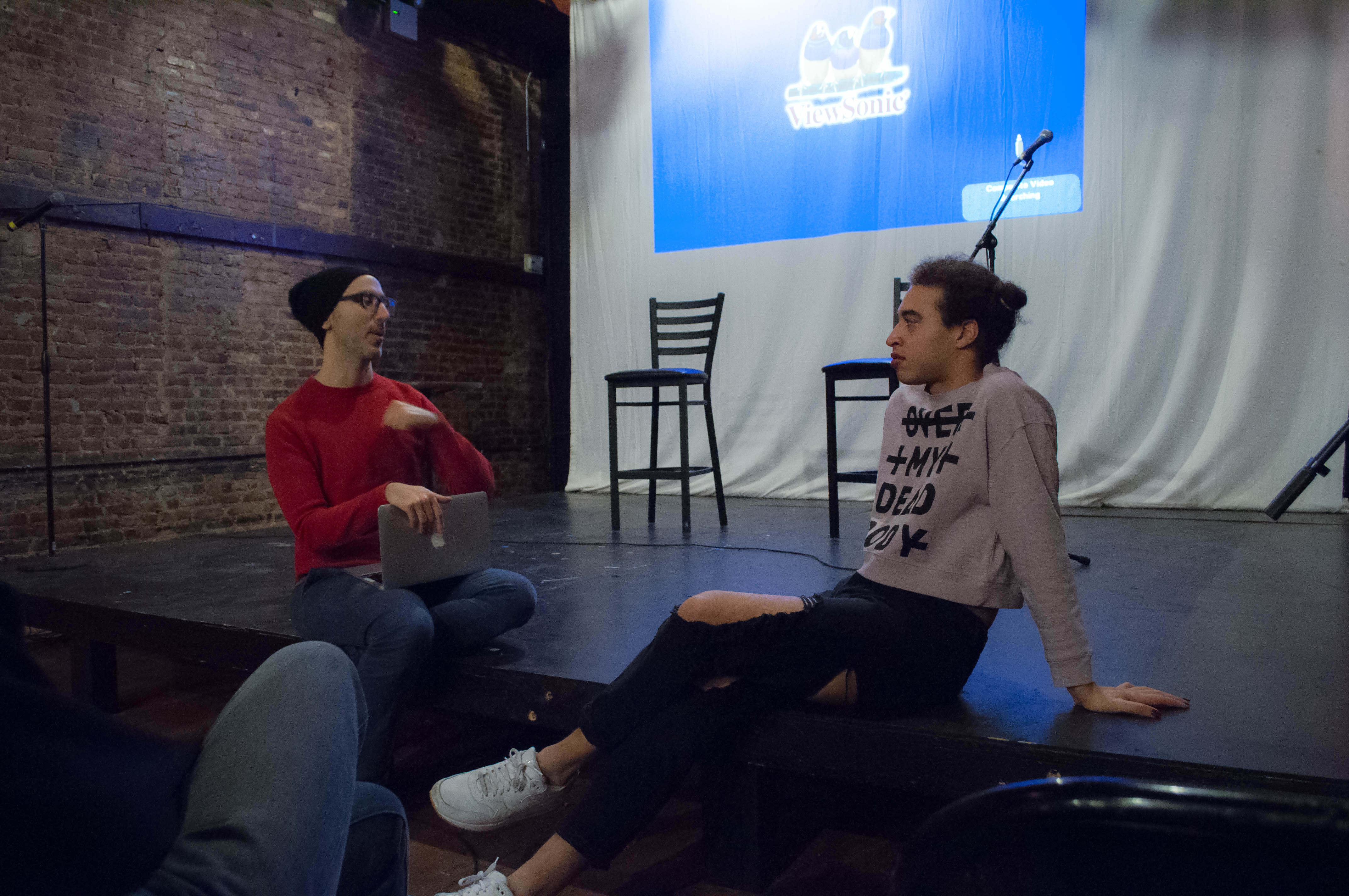 Zach Frater and Dan Fishback (curator and host of Squirts), chatting during rehearsal | Photo by Christian Cisneros